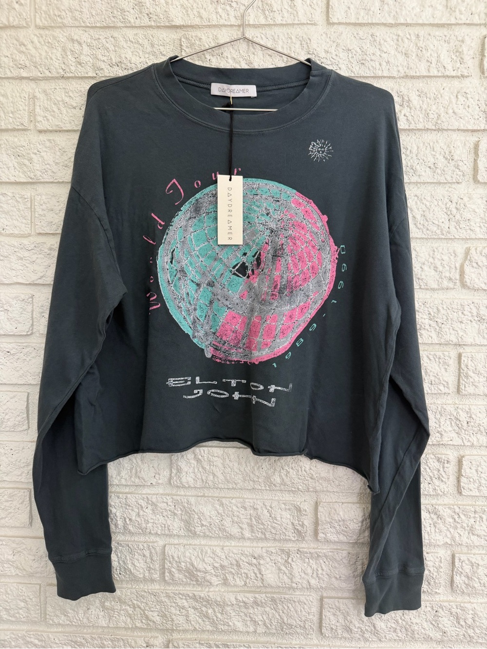 Daydreamer Black Cropped Elton John Graphic Sweatshirt with Pink & Teal Print